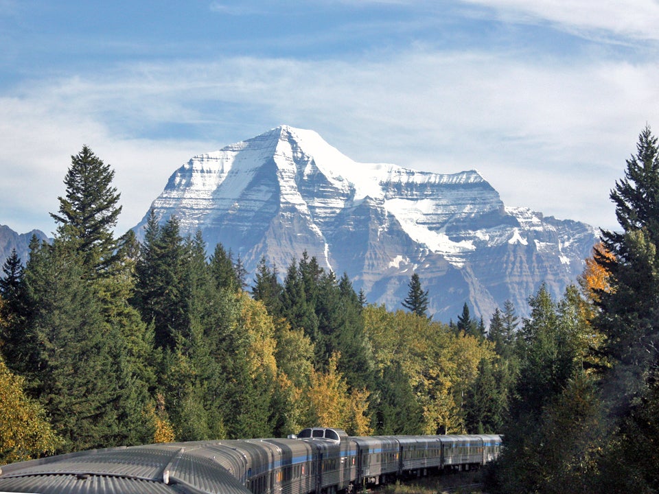 long train with mount robson in Jasper on the background